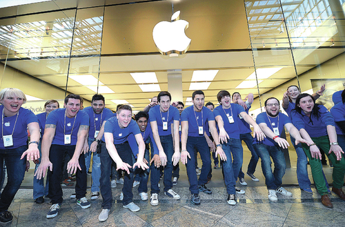 Brand evangelists - Apple employees. Photo by Martin Meissner | AP